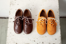 Beautiful smart-casual style lace-up brogue shoes. Made in an classic tan leather with contrast cream laces and a lovely tassel detail. Olivia Ann Shoes