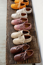 Beautiful smart-casual style lace-up brogue shoes. Made in an classic tan leather with contrast cream laces and a lovely tassel detail. Olivia Ann Shoes