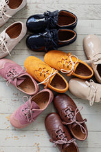 Beautiful smart-casual style lace-up brogue shoes. Made with an adorable mustard colour suede with contrast cream laces and a lovely tassel detail. Olivia Ann Shoes.