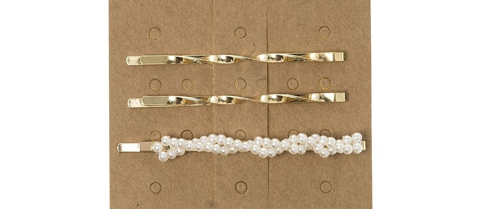 Pack of 3 Hairpins with faux pearls. This trending Pearl Hairpin is the perfect accessory to elevate any outfit! Made from a golden hairpin