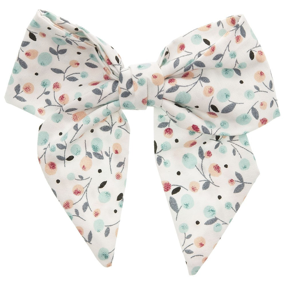 Beautiful hair bow in a delicate light blue floral pattern, a unique handmade piece! Approximately 12 x 10 cm long and secured to 5.5 cm snap hair clip. This bow adds a perfect touch to any outfit!