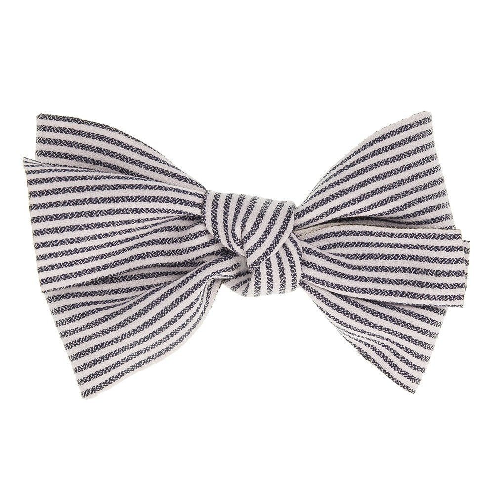 Beautiful hair bow in a delicate navy cotton stripes pattern, a unique handmade piece! Approximately 11.5 x 9 cm long and secured to 5.5 cm snap hair clip.