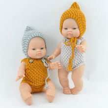 This cosy, textured knitted romper is hand knitted in Europe, specially designed for the 38 cm dolls, but can fit dolls around 34 - 40cm (13 - 15 inch) Miniland, Minikane, Paola Reina Gordis etc.