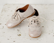 Beautiful smart-casual style lace-up brogue shoes. Made with an adorable combination of Cream Patent Leather and Grey Suede of the highest quality. Olivia Ann Shoes.