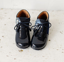 Beautiful smart-casual style lace-up ankle boots with a lovely tassel detail.  Made with an adorable combination of  Navy Patent Leather and Suede of the highest quality. Olivia Ann Shoes.