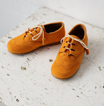 Beautiful smart-casual style lace-up brogue shoes. Made with an adorable mustard colour suede with contrast cream laces and a lovely tassel detail. Olivia Ann Shoes.