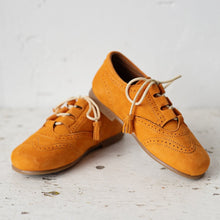 Beautiful smart-casual style lace-up brogue shoes. Made with an adorable mustard colour suede with contrast cream laces and a lovely tassel detail. Olivia Ann Shoes.
