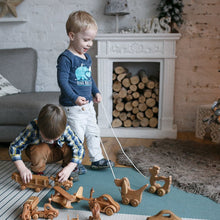 Simple yet stylish wooden toy bus. This simple design makes them super durable. They will not break even if they start knocking or throwing. There are four windows in the body which are very easy to grasp.