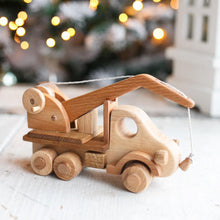 This gorgeous heirloom Wooden Crane is a must-have for any construction site lover.  Its clever design lets your child lift and lower construction materials, heavy pallets and boxes. Just like a real mobile construction crane.