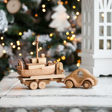 Wonderful set consisting of a beautifully detailed car with a tow trailer. You can use it as it is and add to the trailer whatever toy you want. Add our small boat or our Tug boat as they fit neatly on the back of the transporter.