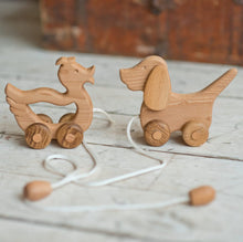 A walk-a long toy is the best toy for those who have already learned to walk. Is comfortable to hold by the smooth wooden handle. This sweet duck is made of solid beech.  Educational Montessori Toy.