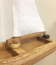 Cutest Heirloom Sailboat with a striped sail. This sailboat is lightweight and floats well on water. The sail is made of natural cotton fabric (stripes or plain white).  We love that these beautifully designed and made boats are not only toys but make the most beautiful decor for kids’ rooms too! Buy our Toy Truck where the sailboat is ideally positioned in the trailer, hours of fun!