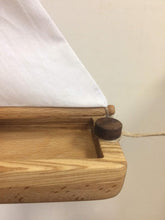 Cutest Heirloom Sailboat with a striped sail. This sailboat is lightweight and floats well on water. The sail is made of natural cotton fabric (stripes or plain white).  We love that these beautifully designed and made boats are not only toys but make the most beautiful decor for kids’ rooms too! Buy our Toy Truck where the sailboat is ideally positioned in the trailer, hours of fun!