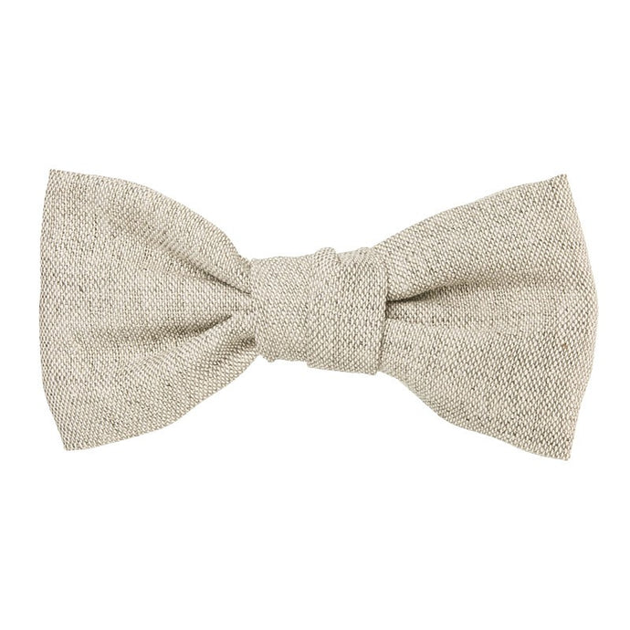 Beautiful and classic Linen bow in an alligator hair clip. This bow adds a perfect touch to any outfit! Timeless design a must have!. Handmade in Spain. Olivia Ann Wholesale accessories.