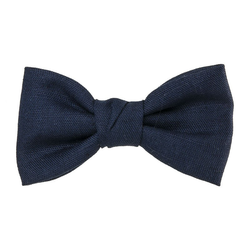 Beautiful and classic Linen bow in an alligator hair clip.This bow adds a perfect touch to any outfit! Timeless design a must have! Handmade in Spain. Olivia Ann Wholesale Accessories.