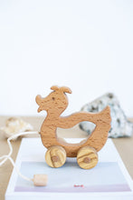 A walk-a long toy is the best toy for those who have already learned to walk. Is comfortable to hold by the smooth wooden handle. This sweet duck is made of solid beech.  Educational Montessori Toy.