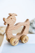 A walk-a long toy is the best toy for those who have already learned to walk. Is comfortable to hold by the smooth wooden handle. This sweet duck is made of solid beech.  Educational Montessori Toy.