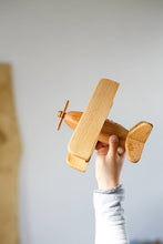 This beautiful wooden airplane is it is made of natural wood (oak and beech). Montessori organic toy. This original design plane is a perfect birthday gift idea for boys & girls or wooden toys collectors.