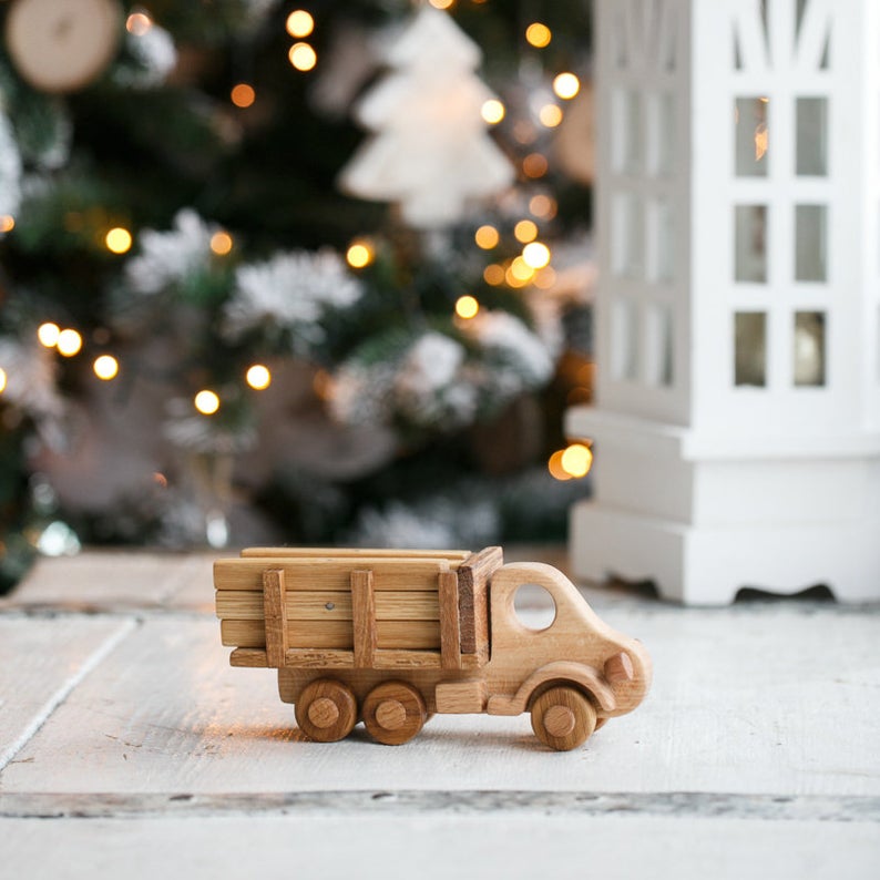 Logging truck - It's great when a toy can interact with surrounding objects. In the trailer of this truck you can transport different things, in this case wooden logs. Wooden toys. Building toys.Heirloom toys.