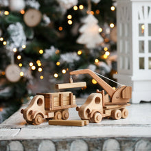 This gorgeous heirloom Wooden Crane is a must-have for any construction site lover.  Its clever design lets your child lift and lower construction materials, heavy pallets and boxes. Just like a real mobile construction crane.