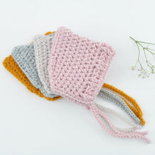 This cosy, textured pixie bonnet is hand knitted in Europe, specially designed for the 21 cm dolls, but can fit dolls around 21 - 30cm ( 8 - 11 inch) Baby Miniland or similar.