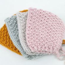 This cosy, textured pixie bonnet is hand knitted in Europe, specially designed for the 38 cm dolls, but can fit dolls around 34 - 40cm (13 - 15 inch) Miniland, Minikane, Paola Reina Gordis etc.