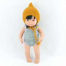 This cosy, textured knitted romper is hand knitted in Europe, specially designed for the 38 cm dolls, but can fit dolls around 34 - 40cm (13 - 15 inch) Miniland, Minikane, Paola Reina Gordis etc.