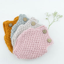 This cosy, textured knitted romper is hand knitted in Europe, specially designed for the 38 cm dolls, but can fit dolls around 34 - 40cm (13 - 15 inch) Miniland, Minikane, Paola Reina Gordis etc.