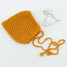 This cosy, textured pixie bonnet is hand knitted in Europe, specially designed for the 38 cm dolls, but can fit dolls around 34 - 40cm (13 - 15 inch) Miniland, Minikane, Paola Reina Gordis etc.