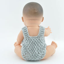 This cosy, textured knitted romper is hand knitted in Europe, specially designed for the 32 cm dolls, but can fit dolls around 30-34cm (11 - 13 inch) Miniland, Minikane, Paola Reina Gordis etc.