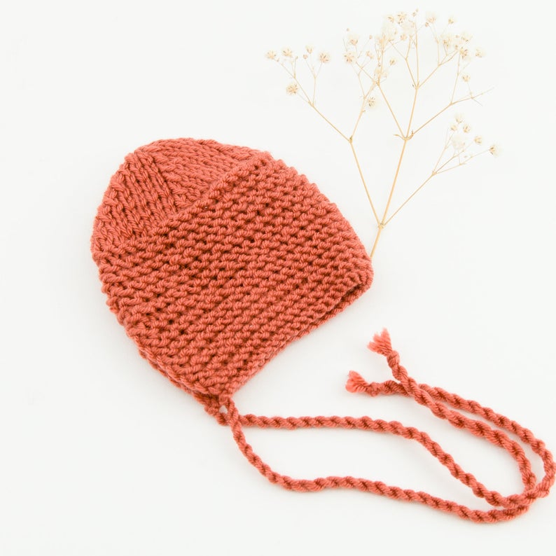 This cosy bonnet is hand knitted in Europe, specially designed for the 34 cm dolls, but can fit dolls around 32 - 38 cm (12 - 15 inch) Miniland, Minikane, Paola Reina Gordis and similar.