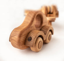 Wonderful set consisting of a beautifully detailed car with a tow trailer. You can use it as it is and add to the trailer whatever toy you want. Add our small boat or our Tug boat as they fit neatly on the back of the transporter.