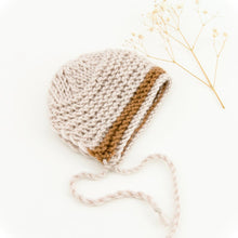 This cosy bonnet is hand knitted in Europe, specially designed for the 32 cm dolls, can fit dolls around 30 - 34 cm (11- 13 inch) Miniland, Minikane, Paola Reina Gordis and similar.