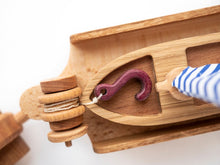 Wonderful set consisting of a beautifully detailed car with a tow trailer. You can use it as it is and add to the trailer whatever toy you want. Add our small boat or our Tug boat as they fit neatly on the back of the transporter.