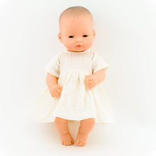 Make your little one's day with this divine doll's ecru muslin dress today. Our dolls clothing is super adorable and of amazing quality, will absolutely melt your heart. Doll dress miniland, minikane, paola reina clothes. Olivia Ann doll clothes