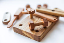 This hand-crafted Wooden Construction / Tools Set is incredible realistic and features tools with movable parts. Made from solid ash and beech wood and covered with natural oils. Perfectly polished for an heirloom quality toy . Poltora Stolyara. Australia.
