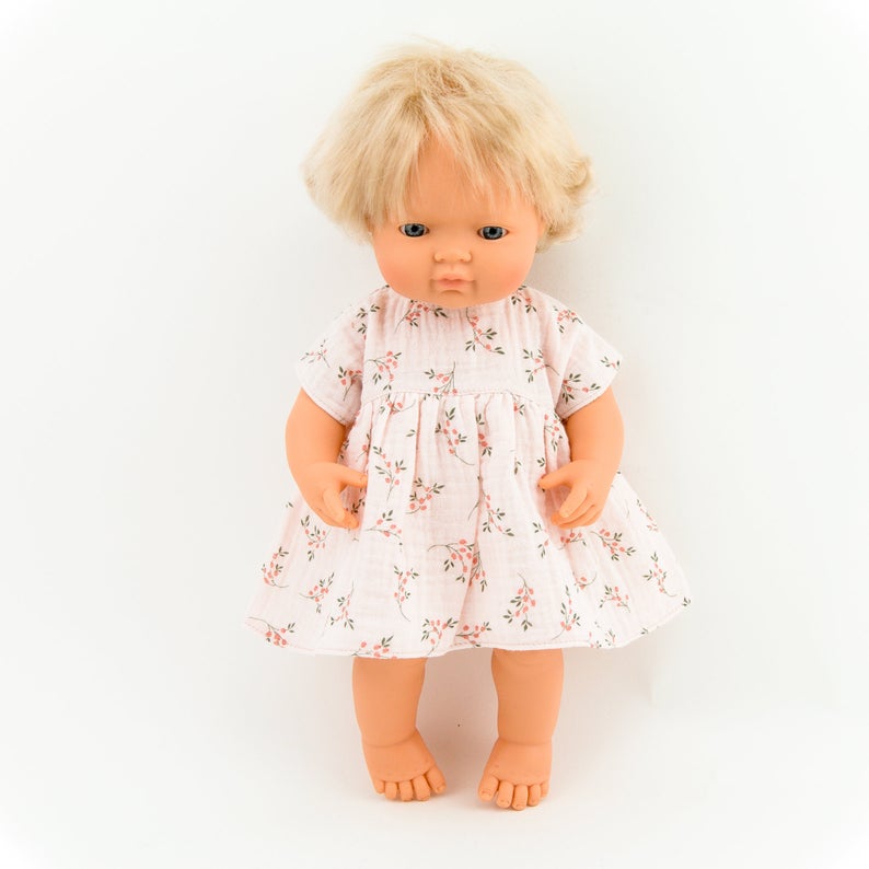 Make your little one's day with this divine doll's floral muslin dress today. Our dolls clothing is super adorable and of amazing quality, will absolutely melt your heart. Doll dress miniland, minikane, paola reina clothes. Olivia Ann doll clothes
