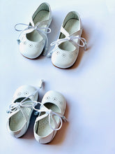 The sweetest Mary Jane Shoes with silk laces and tassel detail! Made with the finest locally sourced Spanish leather.