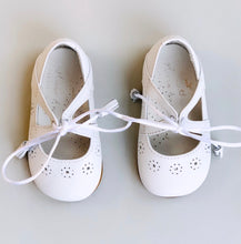 The sweetest Mary Jane Shoes with silk laces and tassel detail! Made with the finest locally sourced Spanish leather.