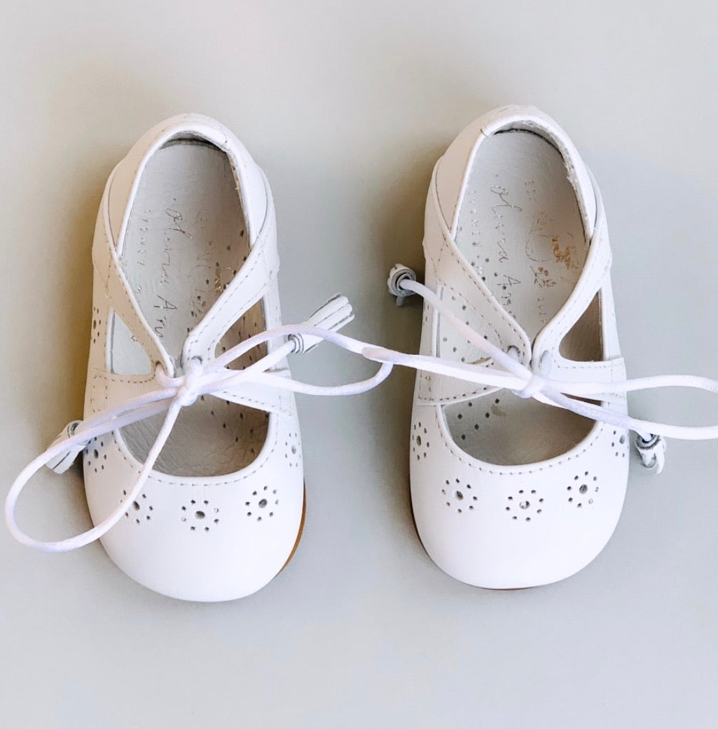 The sweetest Mary Jane Shoes with silk laces and tassel detail! Made with the finest locally sourced Spanish leather.