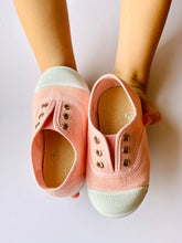 Our OLIVIA ANN soft canvas shoes have a new and improved material that is supersoft and comfortable, and perfect for speedy slip-ons when there's a game in the garden that can't wait.  Sneakers. Plimsoles