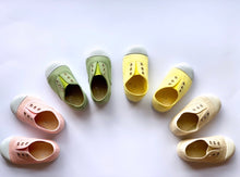 Our OLIVIA ANN soft canvas shoes have a new and improved material that is supersoft and comfortable, and perfect for speedy slip-ons when there's a game in the garden. Plimsoles, sneakers. Kids shoes. Lemon