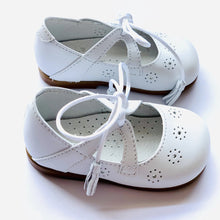 The sweetest Mary Jane Shoes with silk laces and tassel detail! Made with the finest locally sourced Spanish leather.