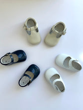 Adorable Olivia Ann Mary Jane Baby Shoes with soft sole they are a classic and oh so adorable pram shoe. Adjustable buckle strap for the perfect fitting.  With a delicate scalloped edged. Olivia Ann Shoes.