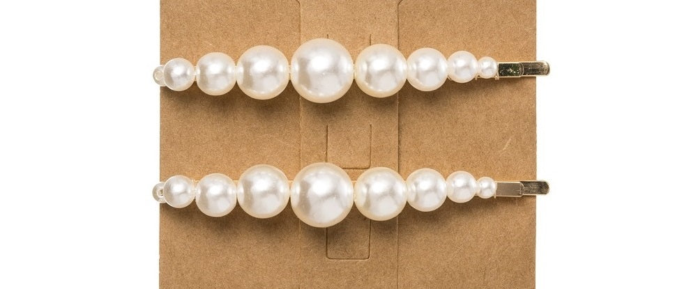 Pack of 2 Hairpins. This trending Pearl Hairpin is the perfect accessory to elevate any outfit! Made from a golden hairpin,