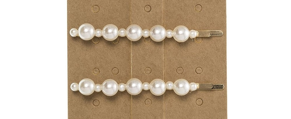 Pack of 2 Hairpins with large and small faux pearls. This trending Pearl Hairpin is the perfect accessory to elevate any outfit!