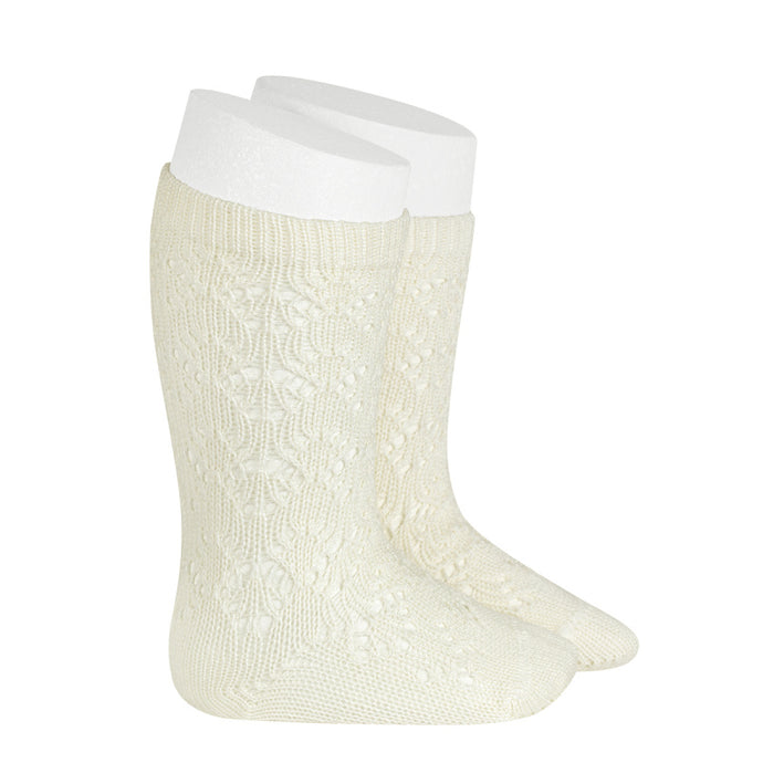 A very special pair of socks, featuring an exquisite openwork geometric design in a delicate beige colour. Very good quality socks. Ideal for Spring and Autumn weather. It will add a beautiful touch to any outfit! Soooo sweet. Condor socks, stockings