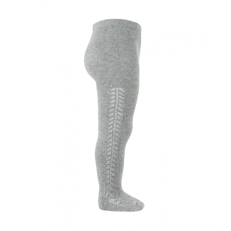 Grey. Aluminium. A very special  pair of tights, featuring an exquisite openwork crochet design on the sides. Made in Spain by Condor.