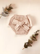 Adorable baby bloomers with a big bow, knitted in beige colour with 100% of the softest cotton.