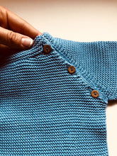 Sweet Unisex knitted Jumper with wooden buttons on the side in an adorable  blue colour. I must have basic piece!
